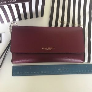 Henri Bendel Uptown Organizer Wristlet wine color